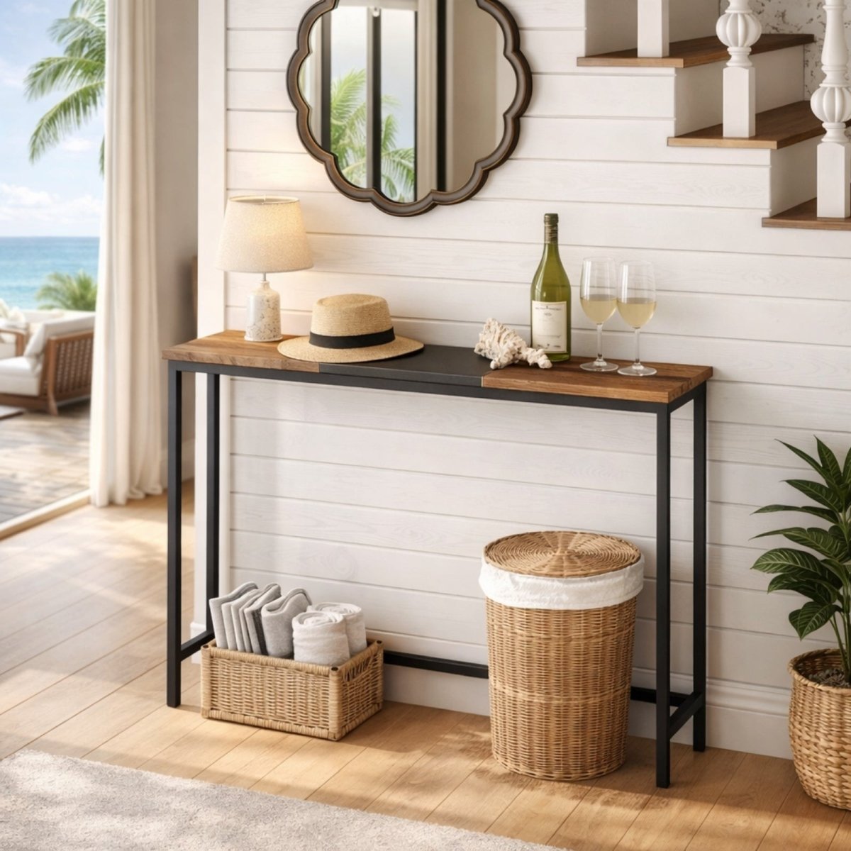 Rustic brown and black metal entryway table with mirror, wine glass, and storage baskets in a coastal home.