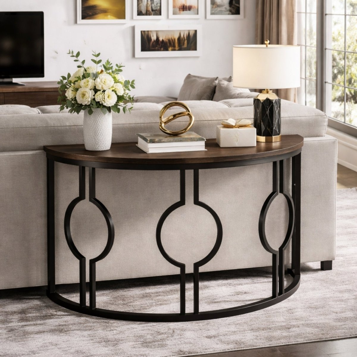 Close up of the dark walnut finish wood grain and sturdy black metal frame construction of the Kouvr console table.