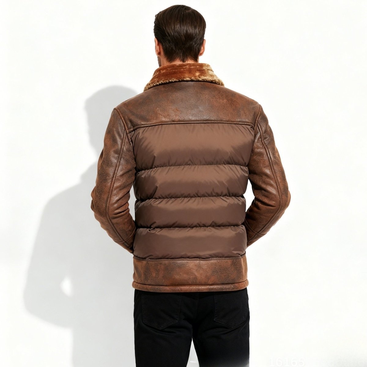 Brown Kouvr leather jacket with fur collar on a white background