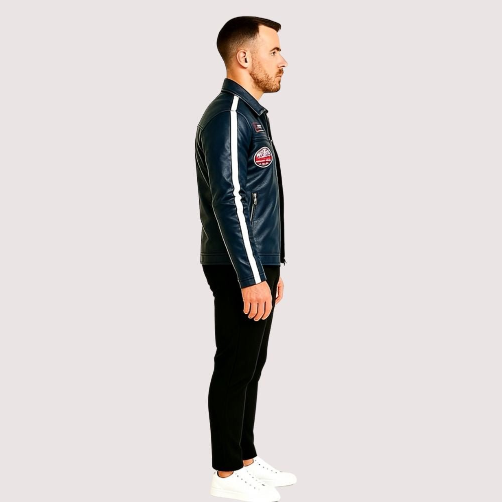 Man wearing the Kouvr Jayce Men's Navy Blue Leather Racer Jacket with embroidered patches and white