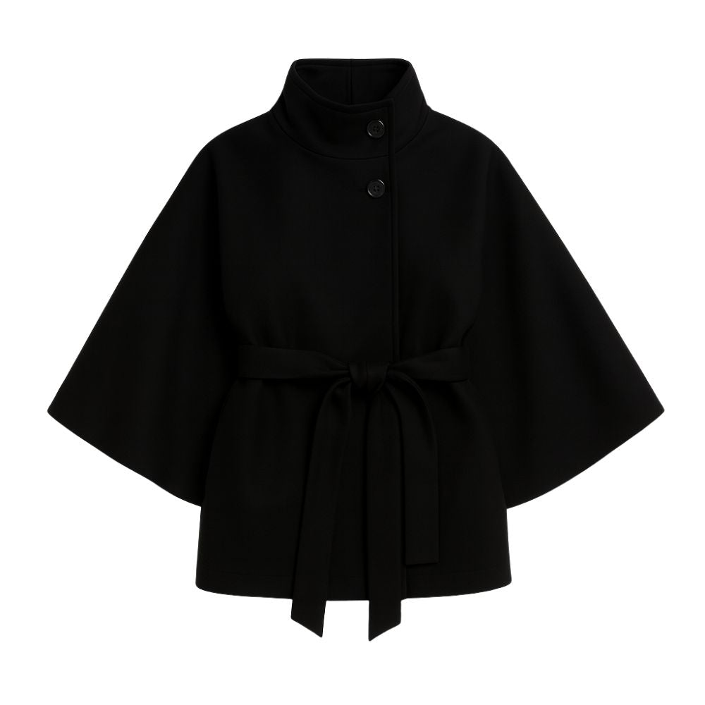 Model wearing the black Kouvr Jaye Cape Jacket, showcasing the tie-back belt and wide kimono sleeves
