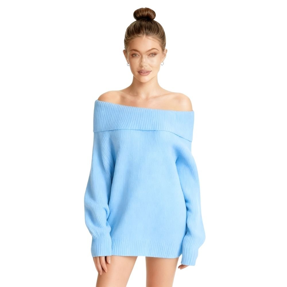 Woman wearing a  light blue kouvr off-shoulder sweater on a white background