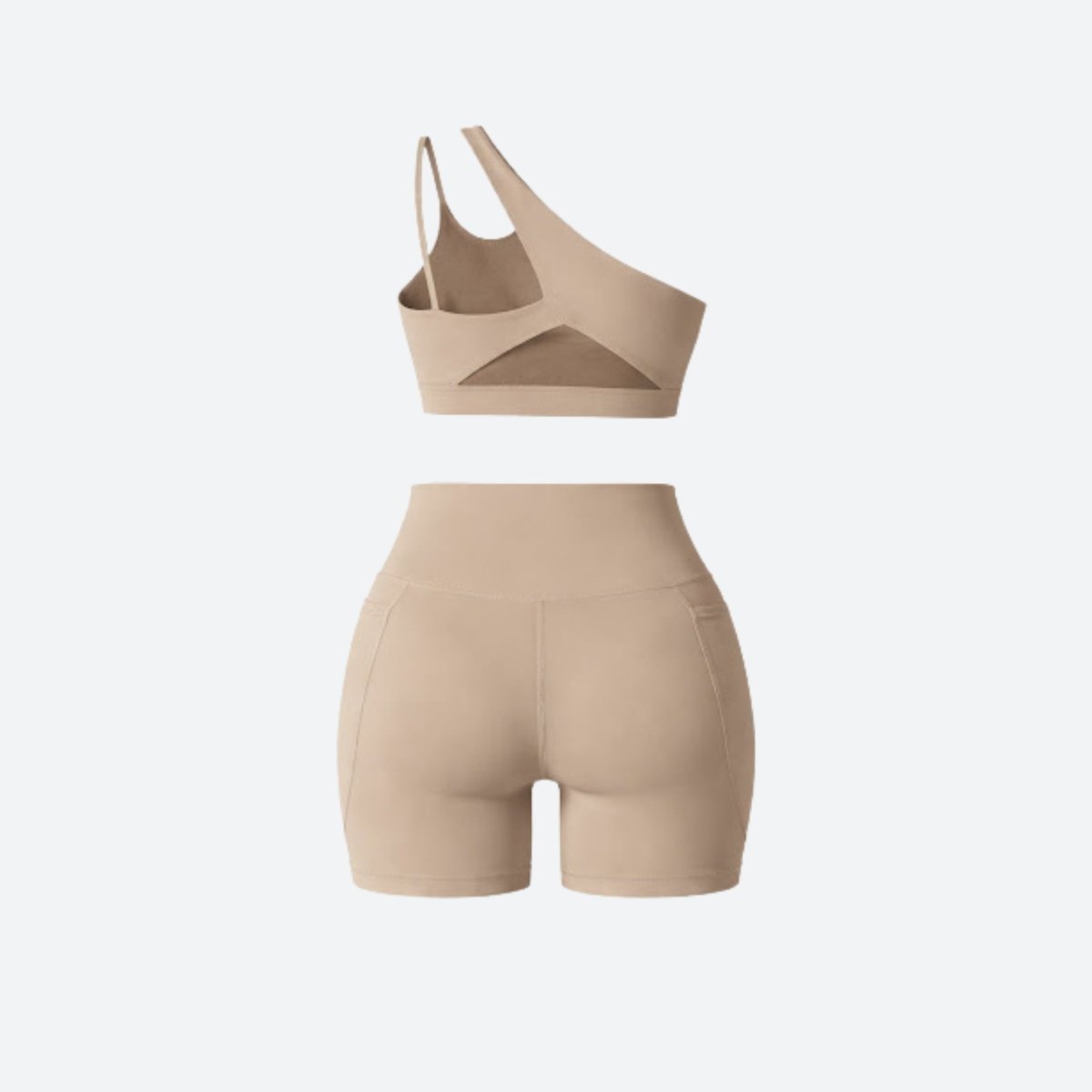 Flat lay back view of Kouvr khaki luxury workout set showing rear sports bra cutout and back seam details of high rise shorts.