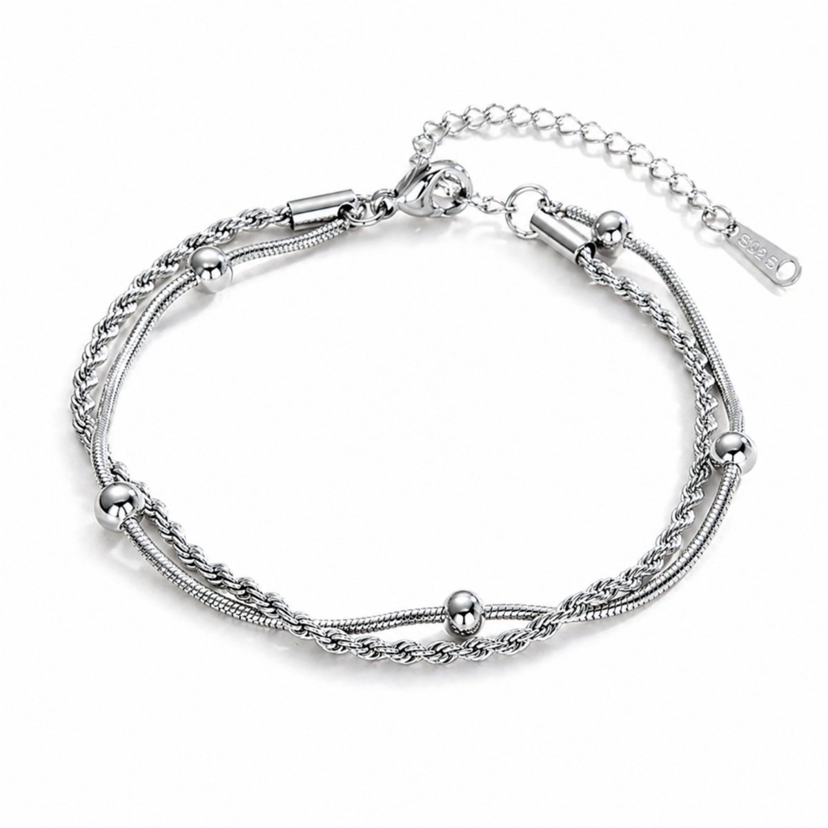A silver layered anklet featuring a rope chain and a beaded snake chain on a clean white background.