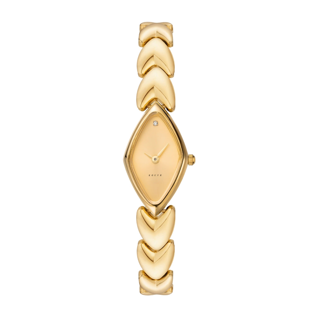 Gold Kouvr watch with a decorative band on a white background