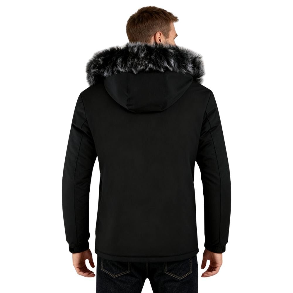 Black kouvr jacket with fur hood worn by a person on a white background