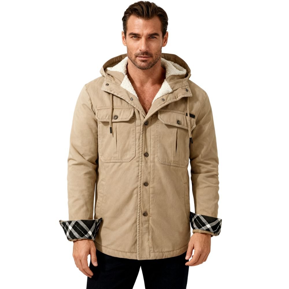 Man wearing a khaki kouvr parka with plaid cuffs on a white background