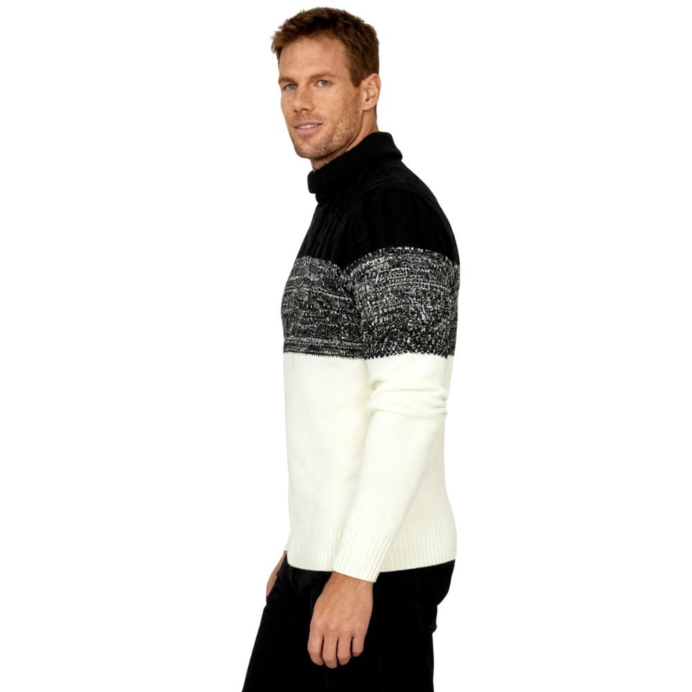 Man wearing a black and white kouvr sweater with a sequined pattern on a white background