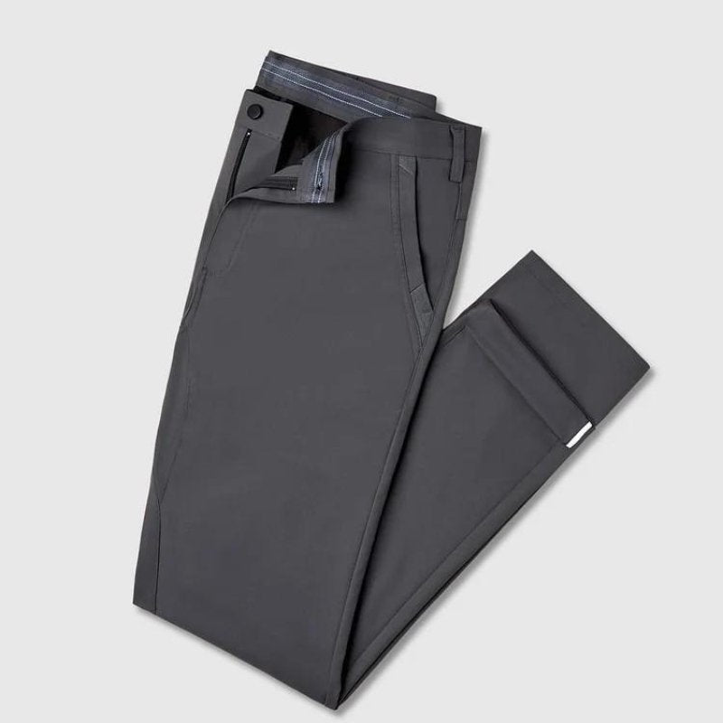 Kouvr All-Day Commuter Pants in graphite grey folded on white background