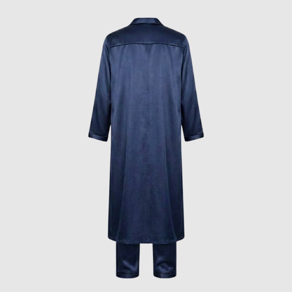 Flatlay image showing the back of the Kouvr long navy satin robe and the cuffs of the pajama pants.