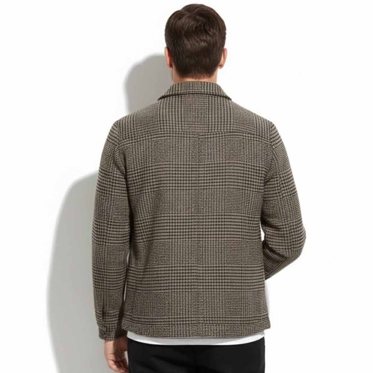 Rear view of the Kouvr men's houndstooth jacket showcasing the pattern alignment and clean back construction.