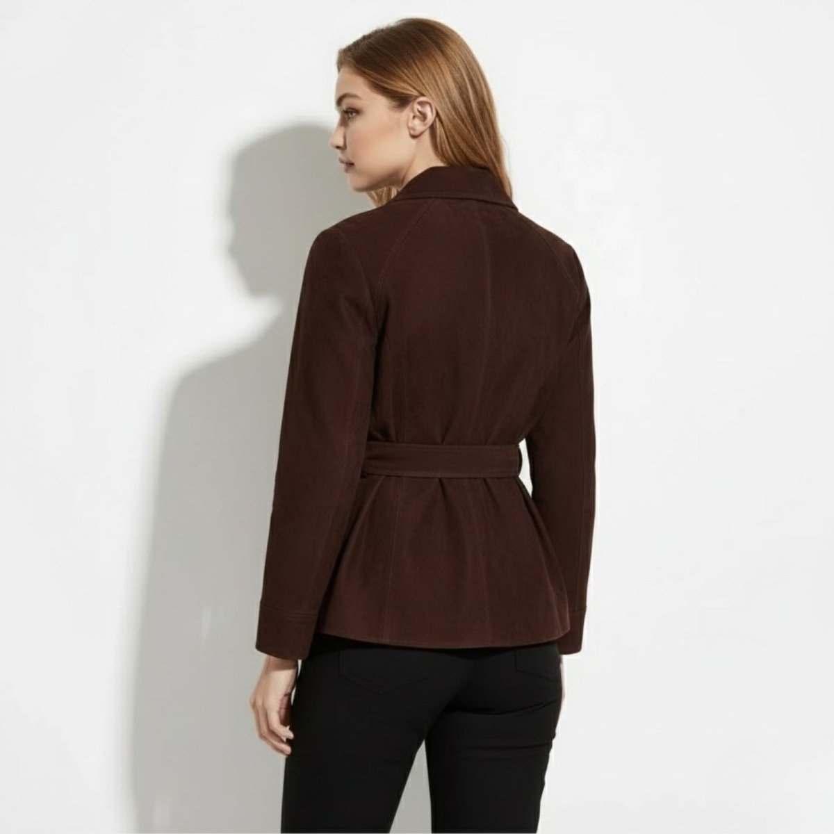 Back view of the Kouvr Myla belted suede jacket in chocolate brown, showing the seam details and belt.