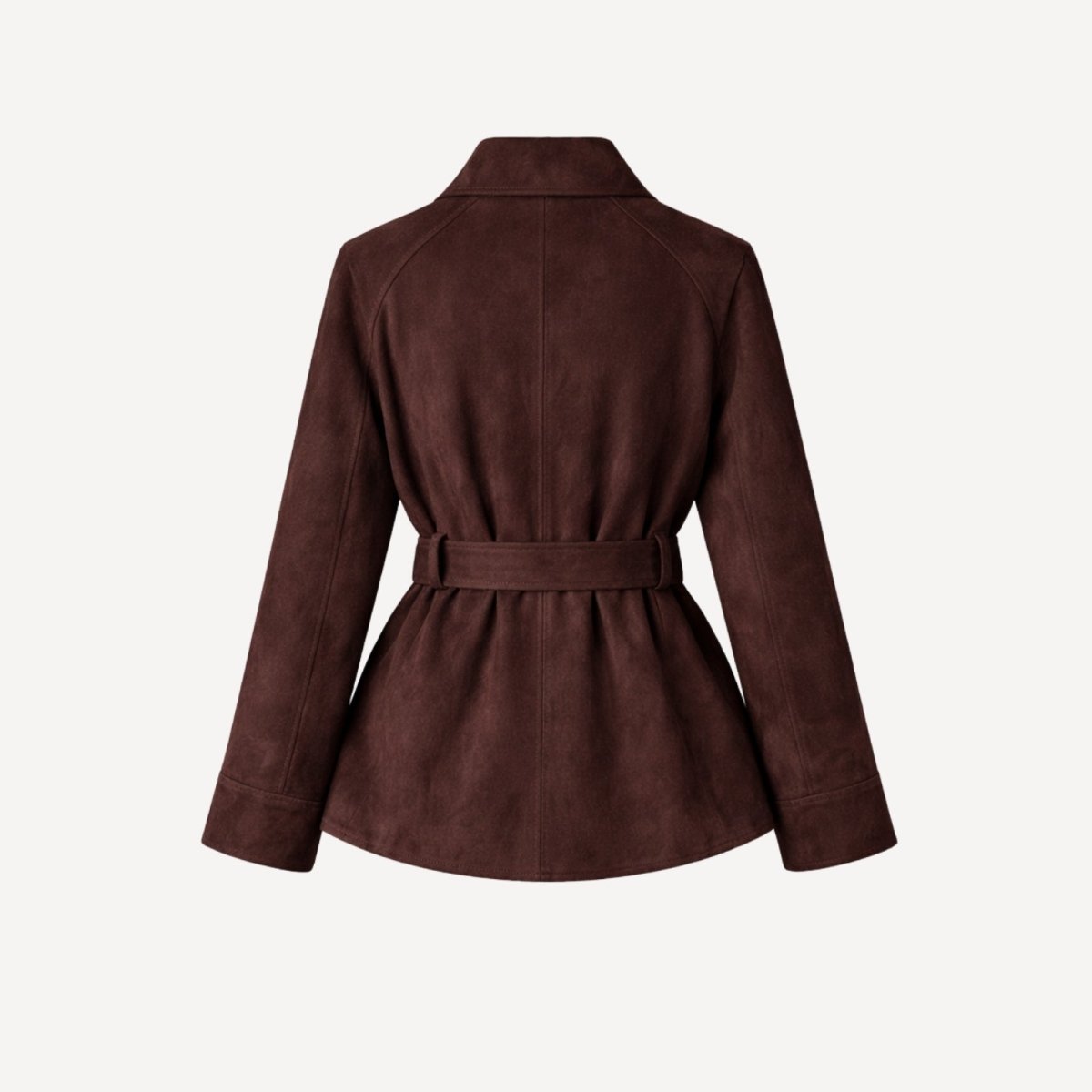 Flatlay of the back of the Kouvr Myla belted suede jacket, highlighting the construction and belt loops.