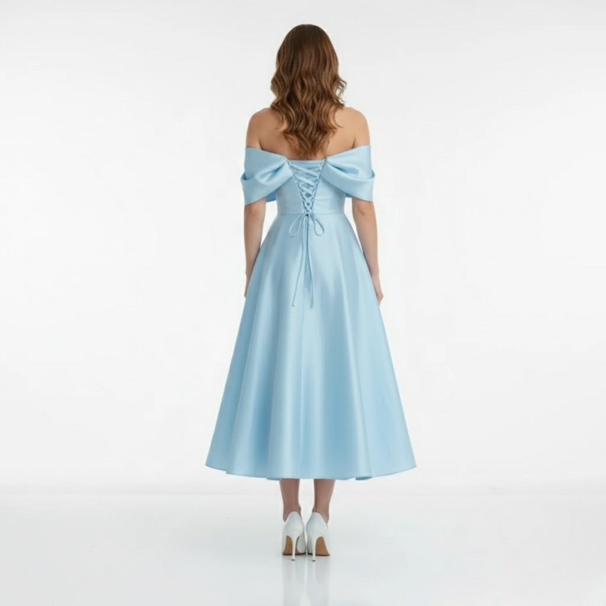 Back view of the Kouvr Nadine light blue formal dress, highlighting the corset lace-up detail on the fitted bodice.