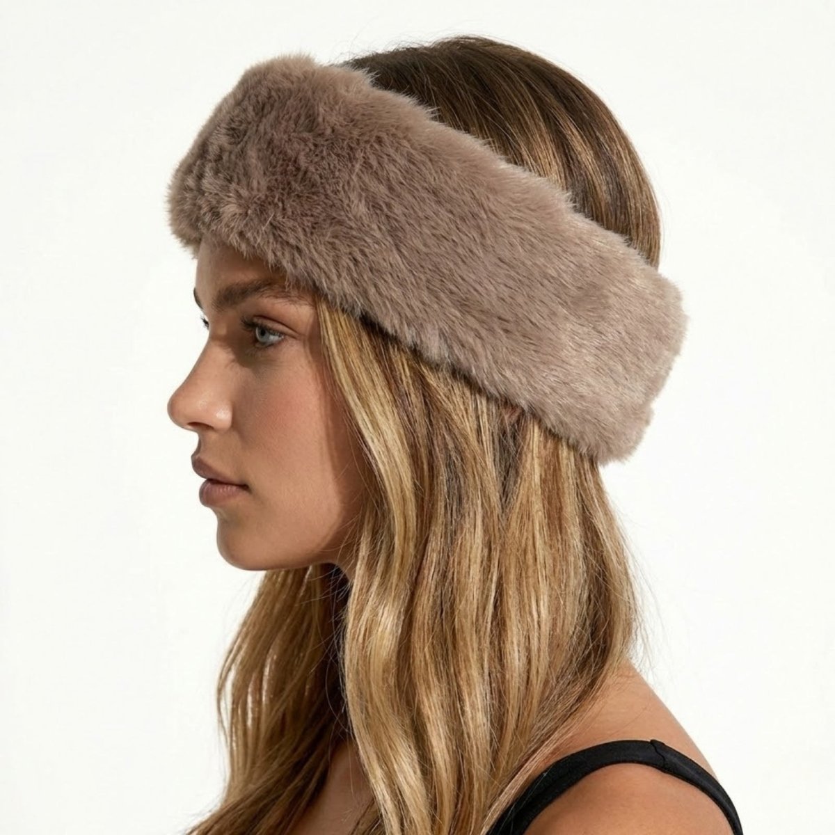 Side profile of a model wearing the Kouvr Nancie plush brown faux fur winter headband.