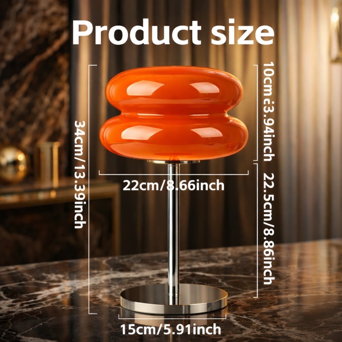 Product dimensions of the Kouvr orange table lamp, showing a total height of 34cm and a width of 22cm on a chrome base.