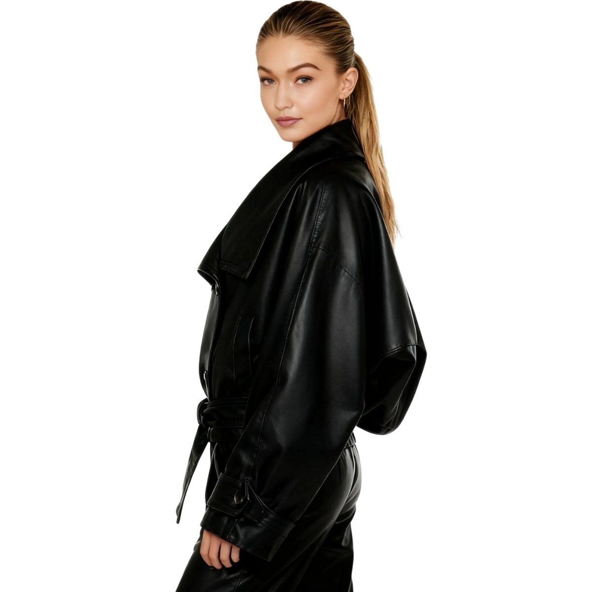 Woman wearing a black kouvr leather jacket on a white background