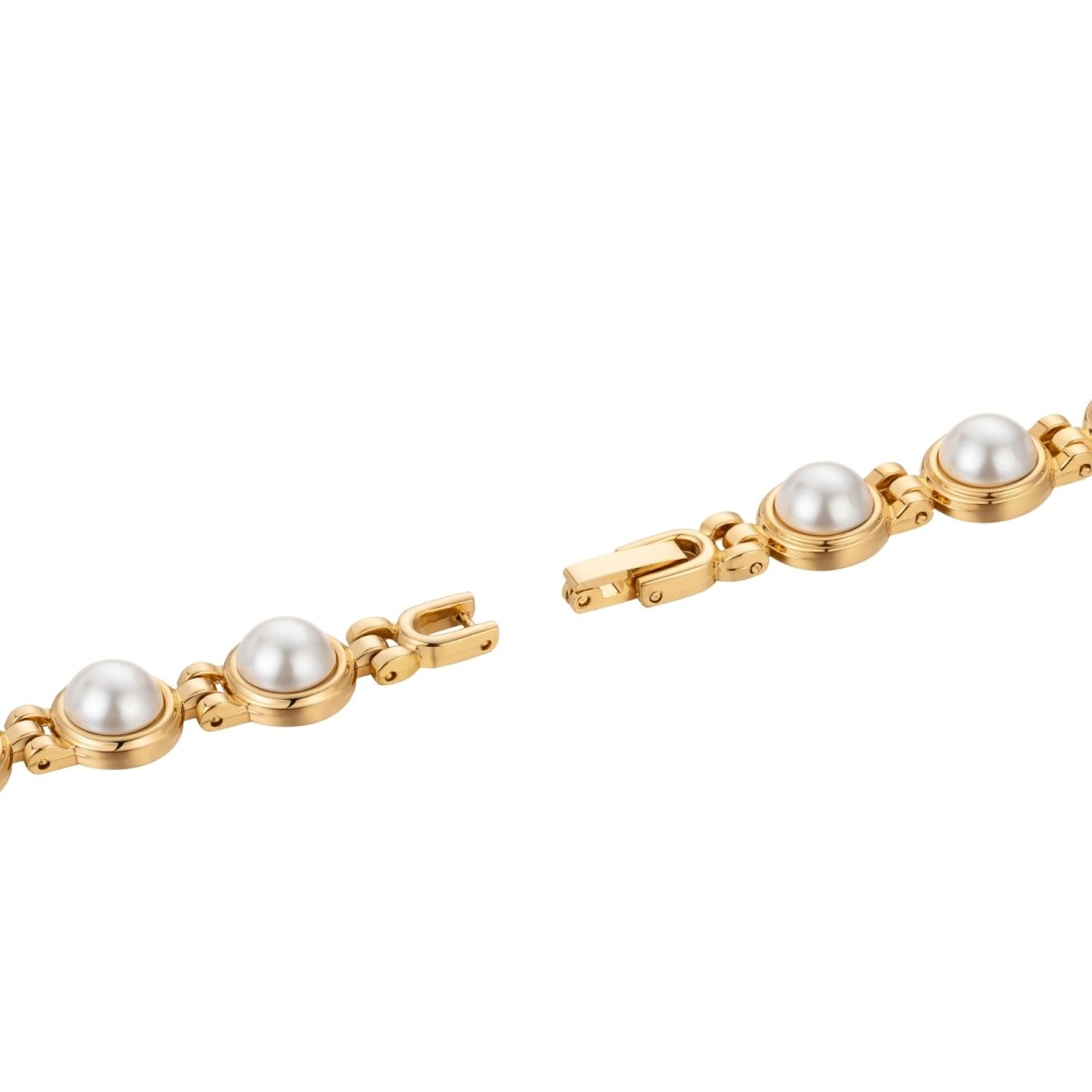 Gold kouvr bracelet with pearls on a white background