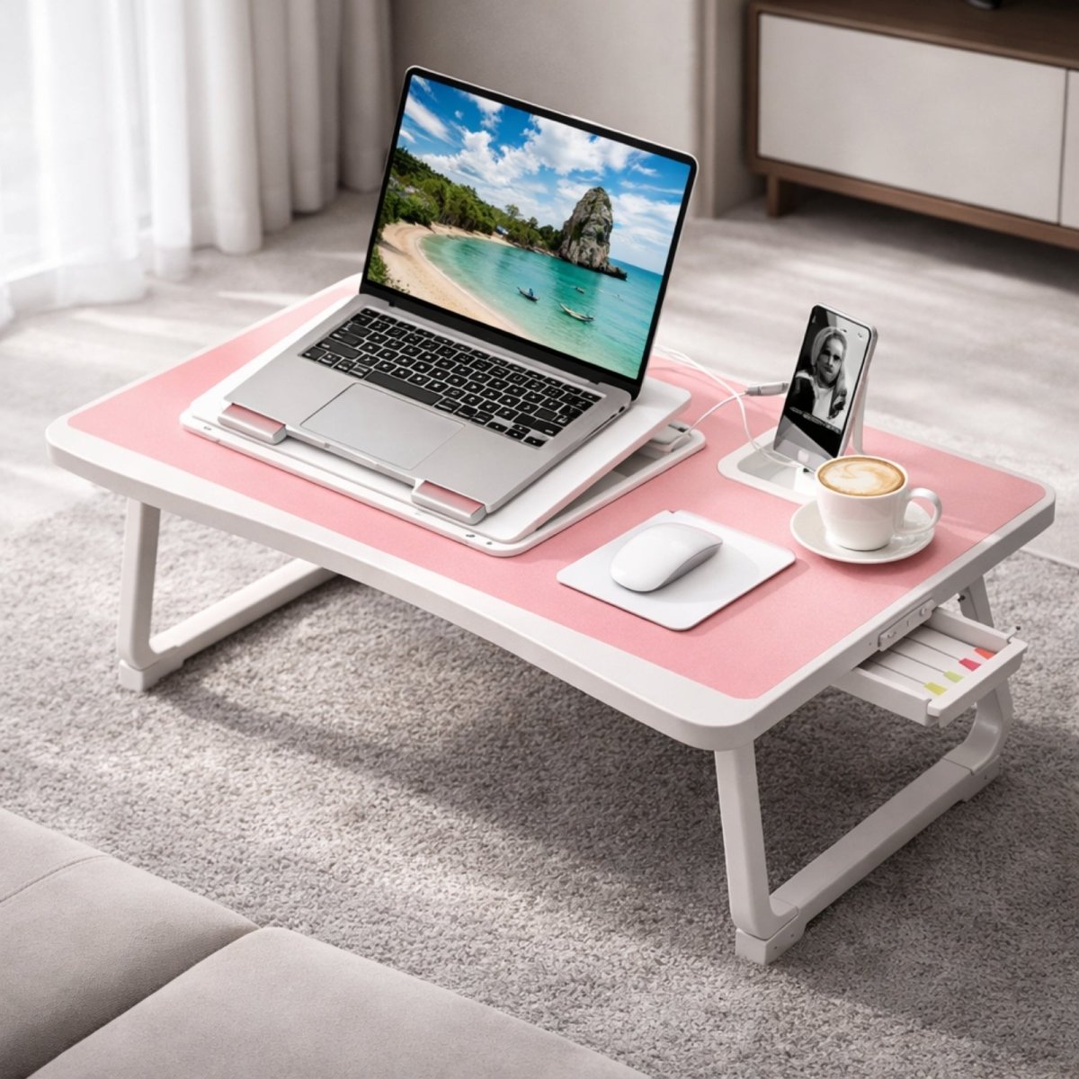 Pink variation of the Kouvr lap desk setup for studying, featuring the tablet groove and easy-access side drawer for highlighters and sticky notes.