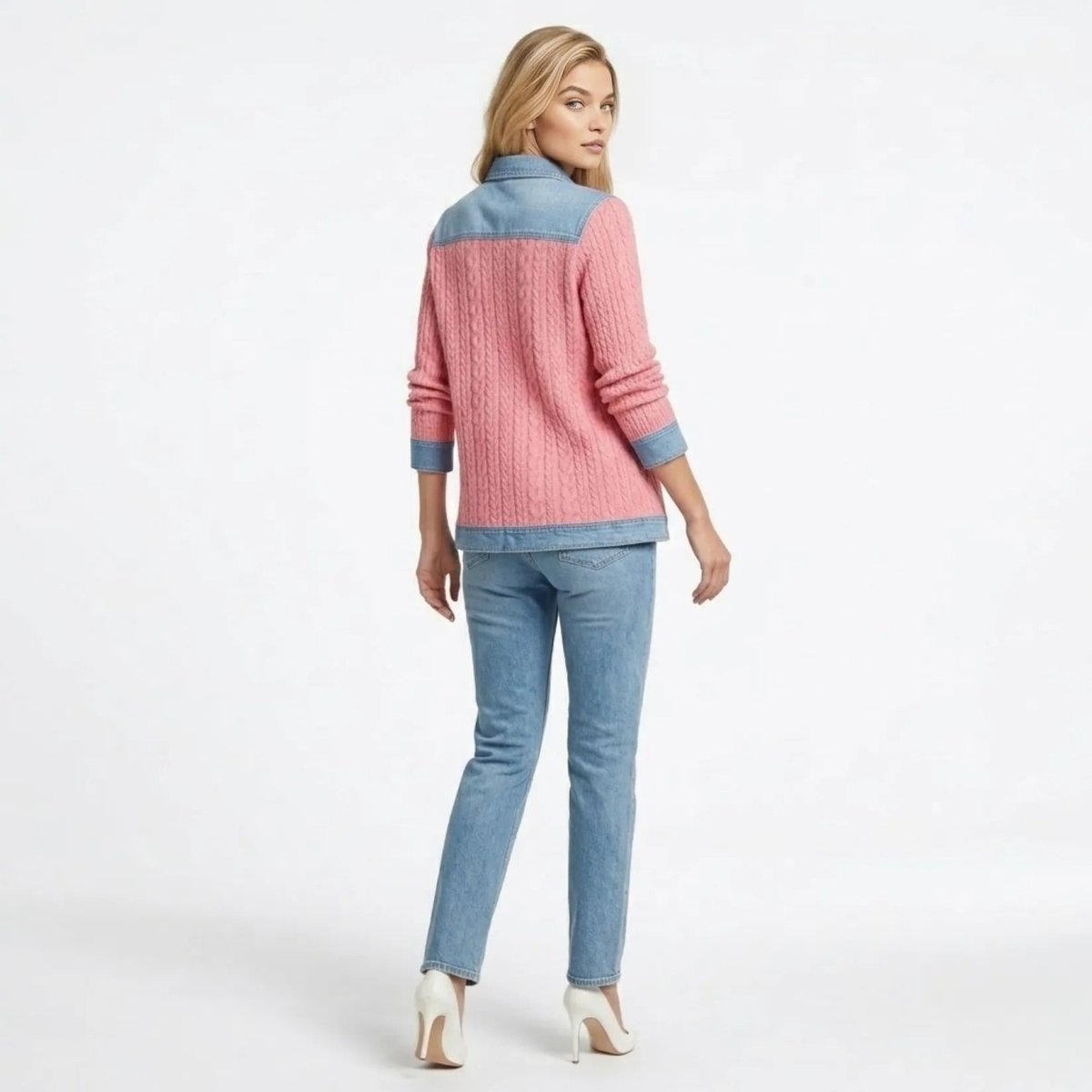 Back view of the Kouvr pink cable knit cardigan highlighting the denim shoulder yoke and hem details.