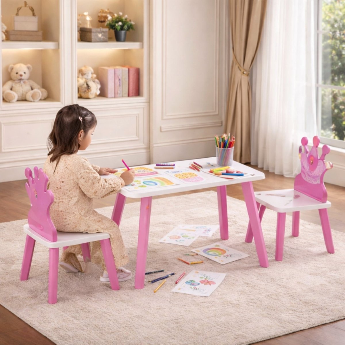 A pink and white princess-themed kids table and chair set from Kouvr, highlighting safety features like 1.1" cylindrical legs and round edges.