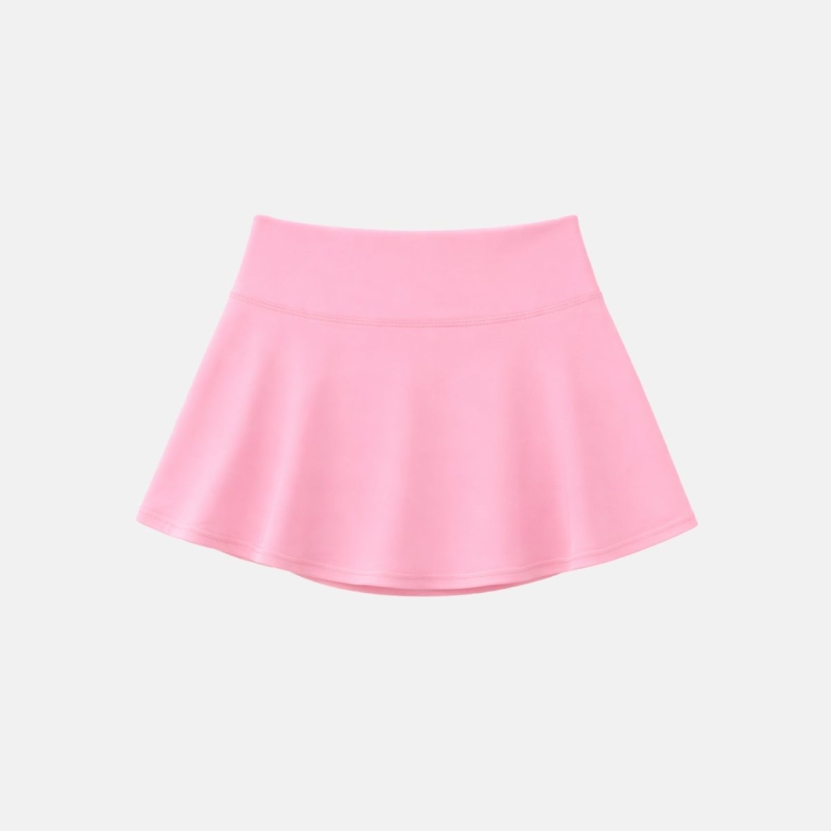 Isolated flat lay product shot of Kouvr pink athletic skirt showing clean seamless back design