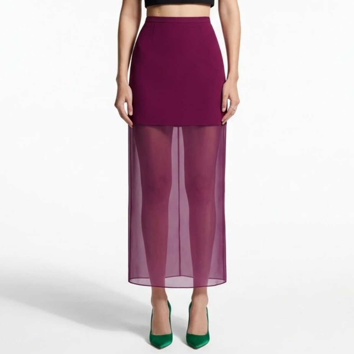 Woman wearing Kouvr plum high waisted sheer overlay maxi skirt looking forward.