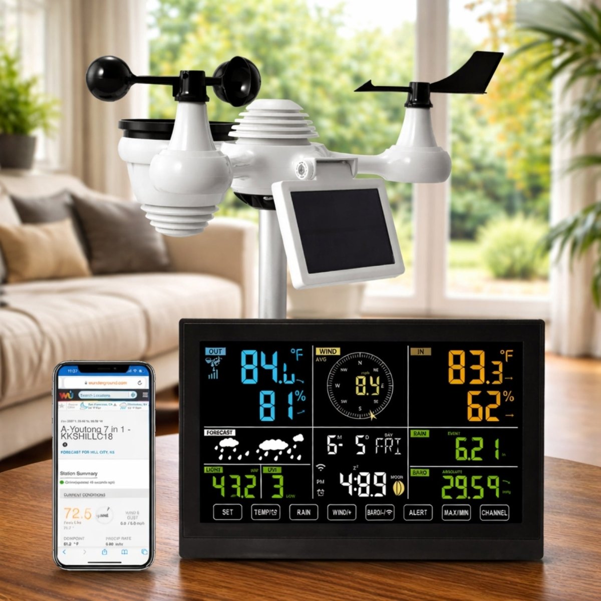 Kouvr Professional WiFi Weather Station with 7-in-1 outdoor solar sensor and a large color display console showing hyper-local weather data on a wooden table.