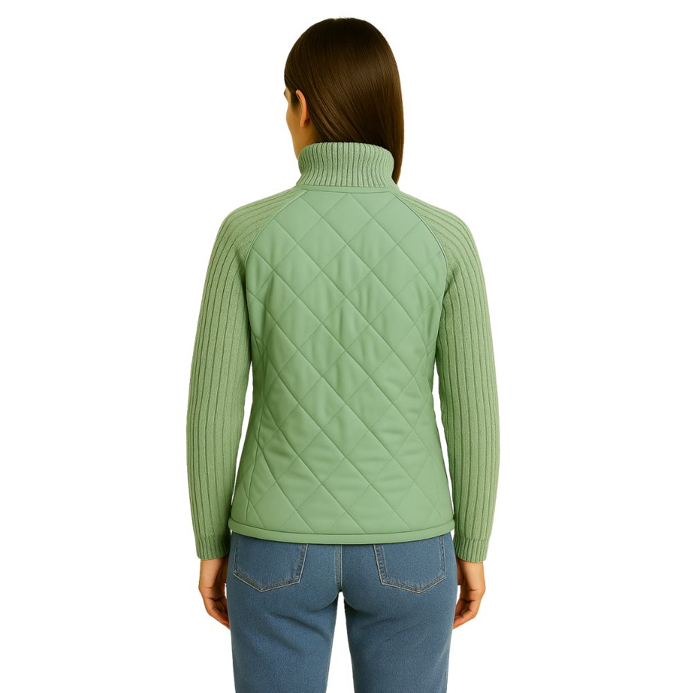 Model wearing Kouvr sage green quilted jacket with cable knit sleeves, viewed from the front