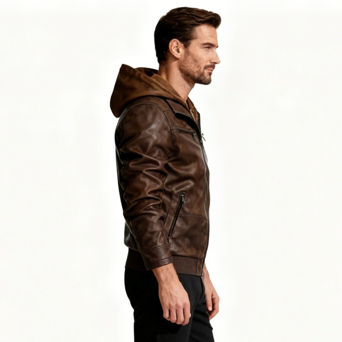 Side profile of a man in a Dark Brown Kouvr faux leather jacket with a hood, showing the fit and sleeve details.