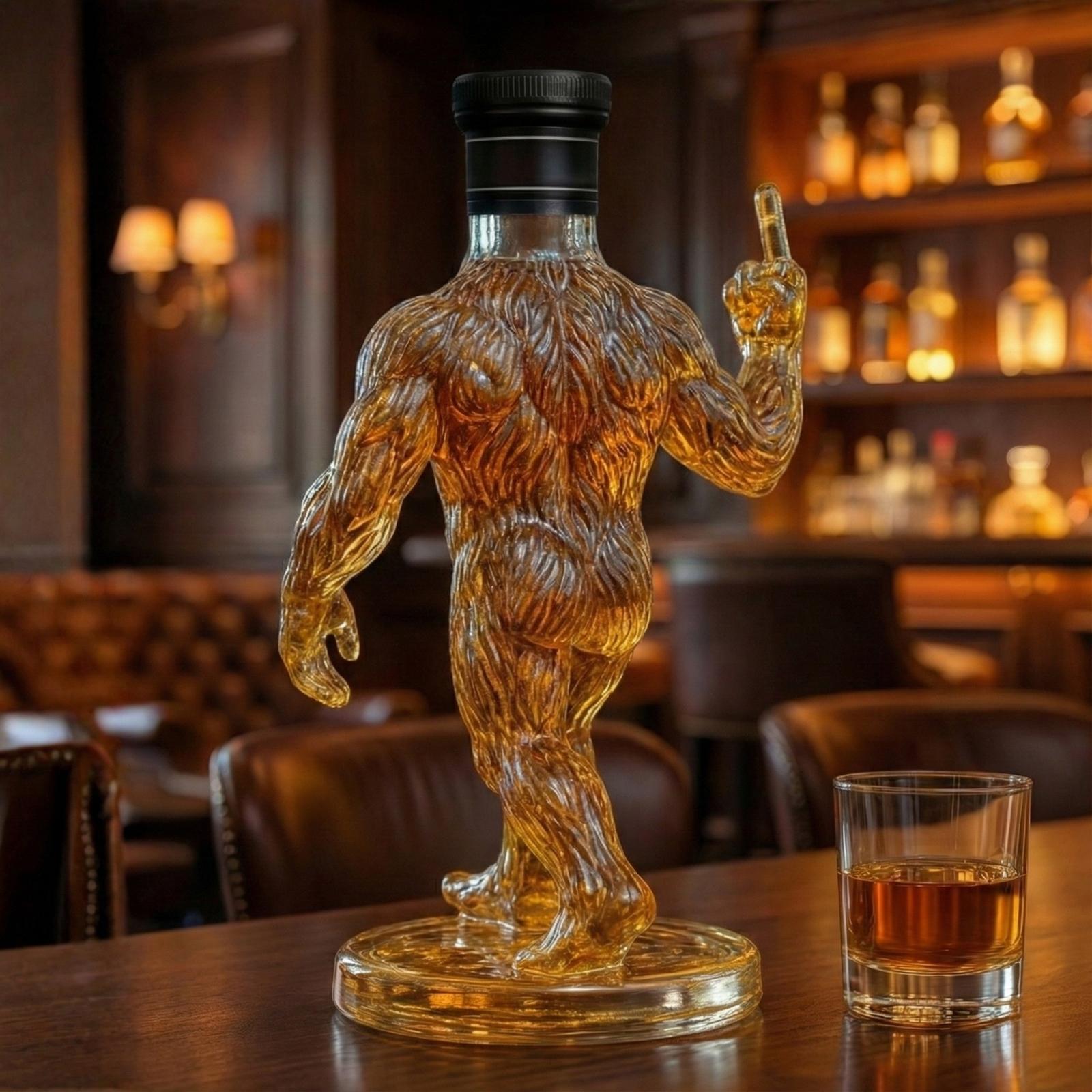 The back view of a muscular, detailed Bigfoot-shaped glass liquor decanter, showing the intricate fur texture and craftsmanship of the unique barware gift.