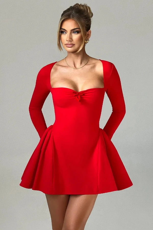 occasionwear," "sculptural dress," "statement piece," "A-line skirt," "cinched waist," and "evening wear