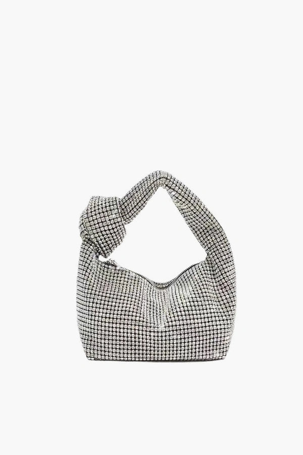 Houndstooth patterned Kouvr handbag on a white background