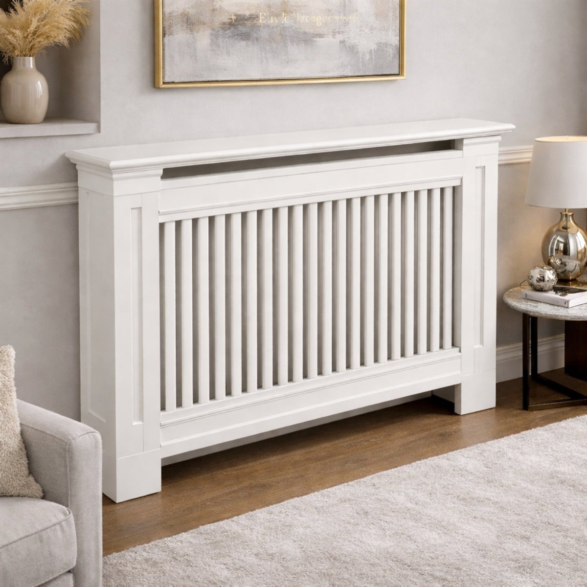A single-panel white wooden radiator cabinet with vertical slats, shown in a well-lit hallway with a decorative lamp on a side table.