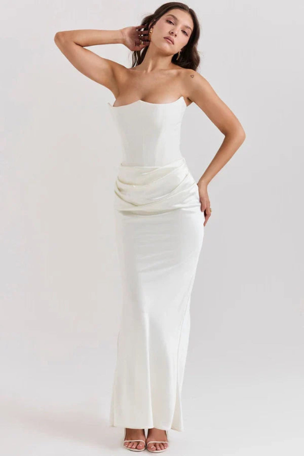 sculptural silhouette, boned bodice, asymmetrical draping, column skirt, heavyweight satin, minimalist evening wear