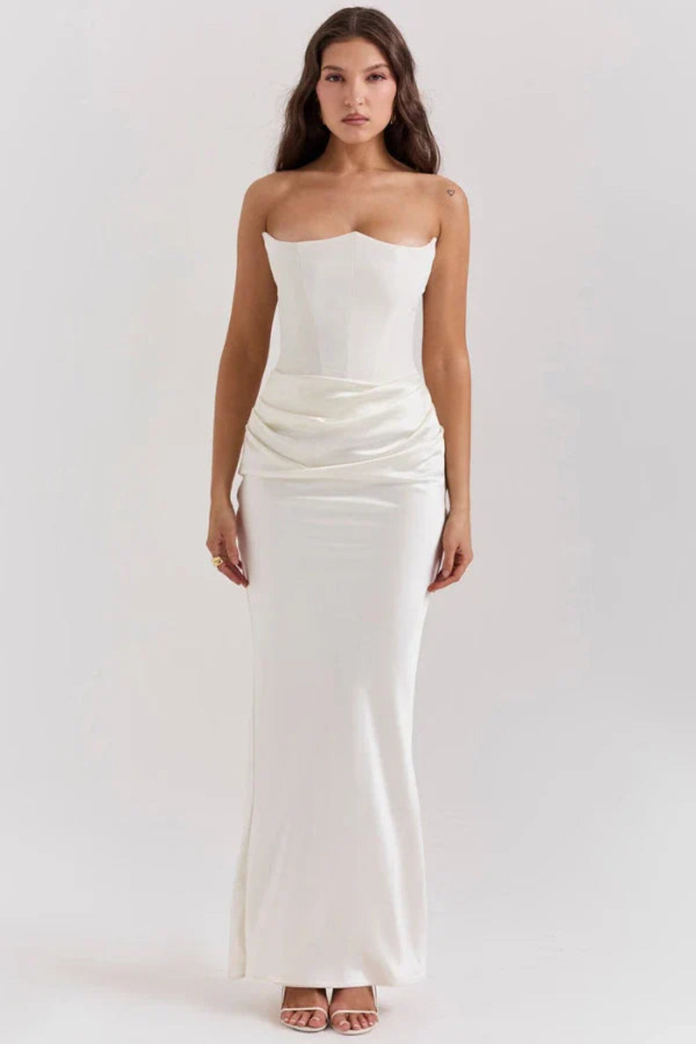 sculptural silhouette, boned bodice, asymmetrical draping, column skirt, heavyweight satin, minimalist evening wear