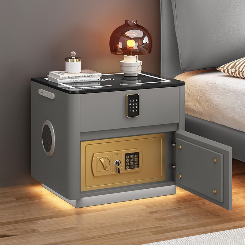 Sleek slate grey modern nightstand illuminated by ambient bottom LED lighting, featuring secure storage solutions and charging ports.
