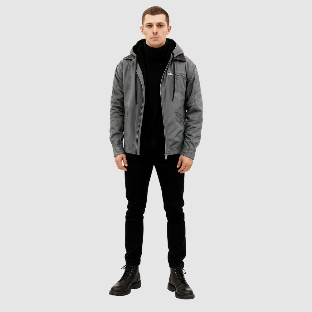 Man wearing the Kouvr tyrian sherpa-lined gray canvas hooded jacket, facing front with hands in pockets.