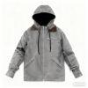Front view of the Men's Kouvr Tyrian sherpa lined hooded work jacket in Coyote Brown.