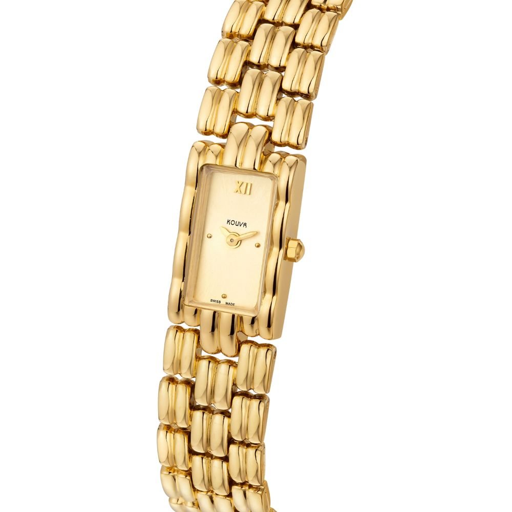 Gold kouvr watch with a rectangular face on a white background