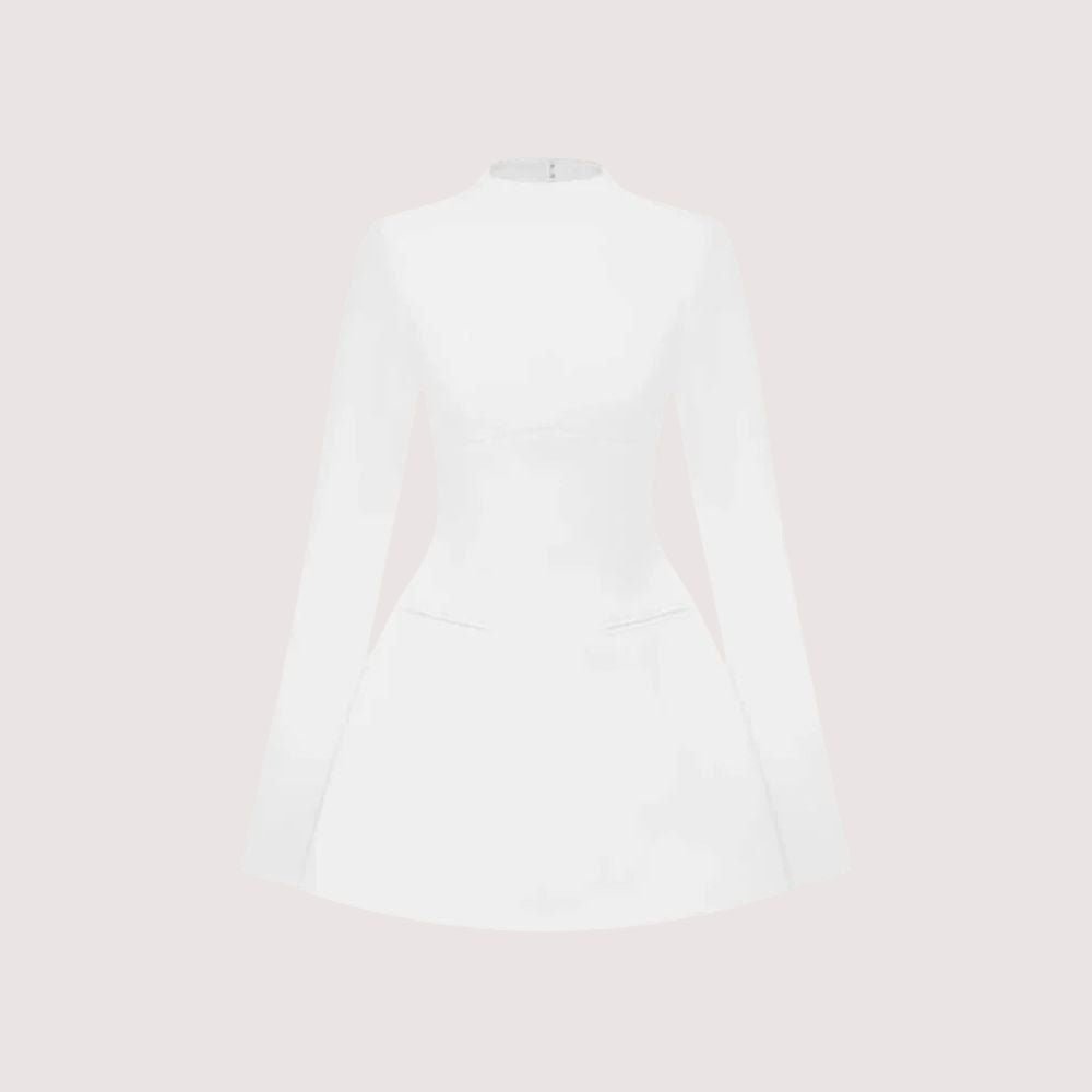 Model wearing Kouvr Fashion white long sleeve mock neck mini dress