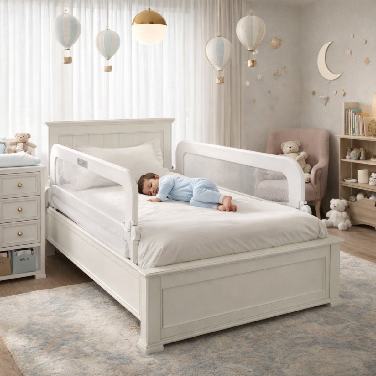 A child sleeping safely in a white full-size bed equipped with two white Kouvr bed rail guards in a beautifully decorated nursery.