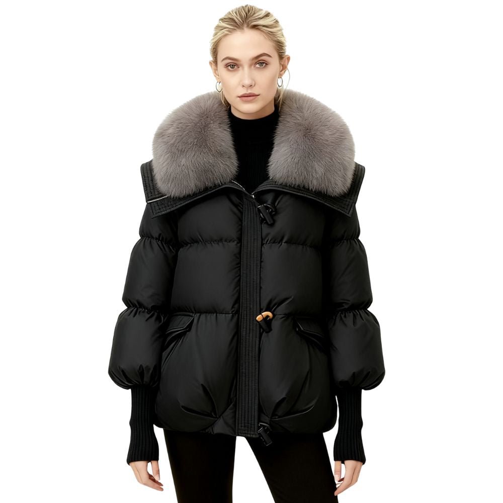 Black kouvr puffer jacket with fur collar worn by a model on a white background