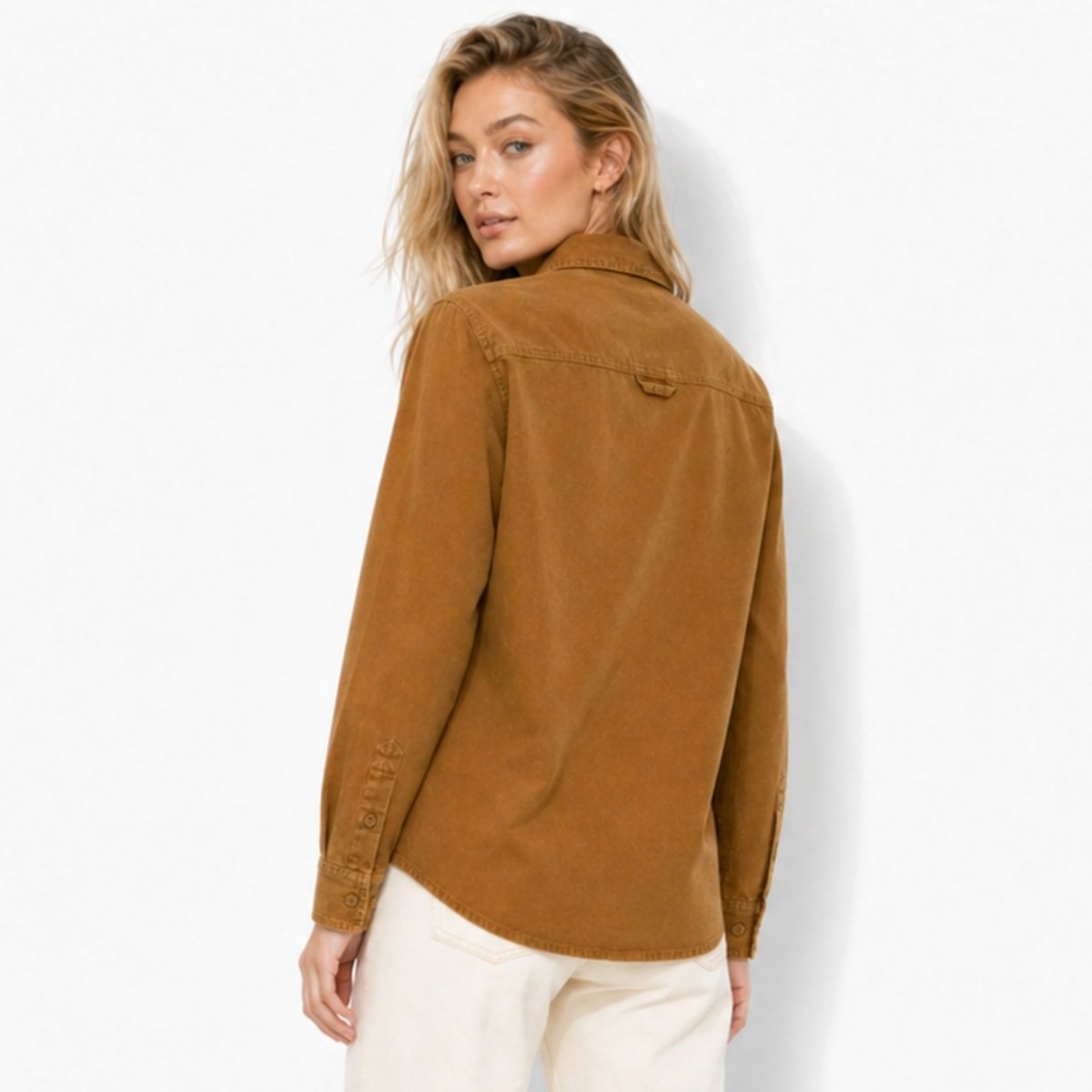 Back view of woman wearing the Kouvr brown corduroy shacket top showing the structured yoke detailing