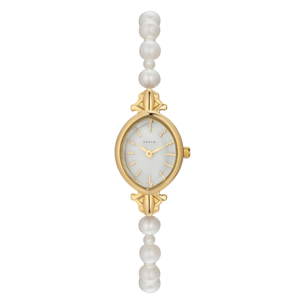 Gold Kouvr watch with pearl-like beads on a white background