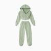 Flatlay of the Kouvr Fashion two-piece green loungewear set, showing the front of the cropped zip hoodie and joggers.