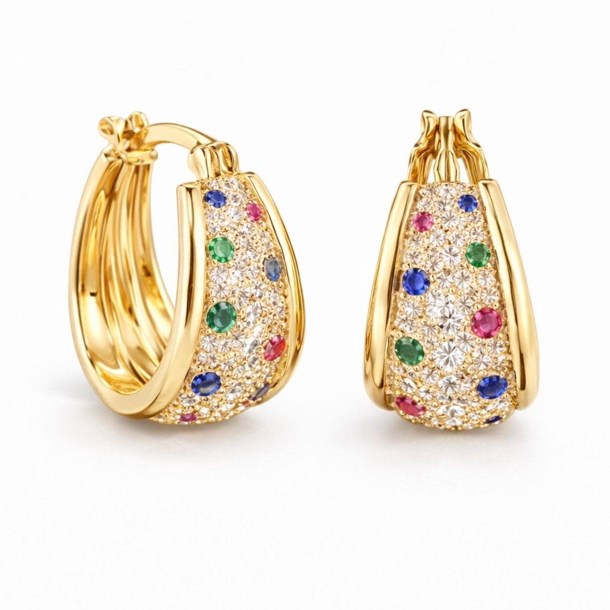 A pair of Kouvr Yvette 18k gold hoop earrings with pavé diamonds, rubies, emeralds, and sapphires on a clean white background.