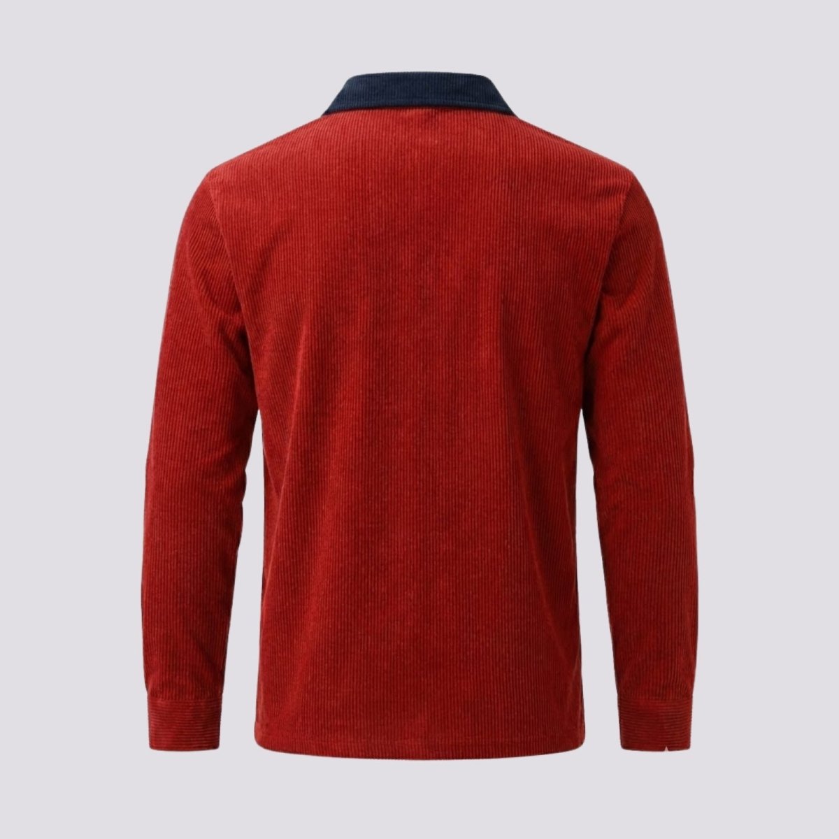 Back view of the Kouvr Zian men's red corduroy polo shirt, showing the solid rust body and contrasting navy collar.