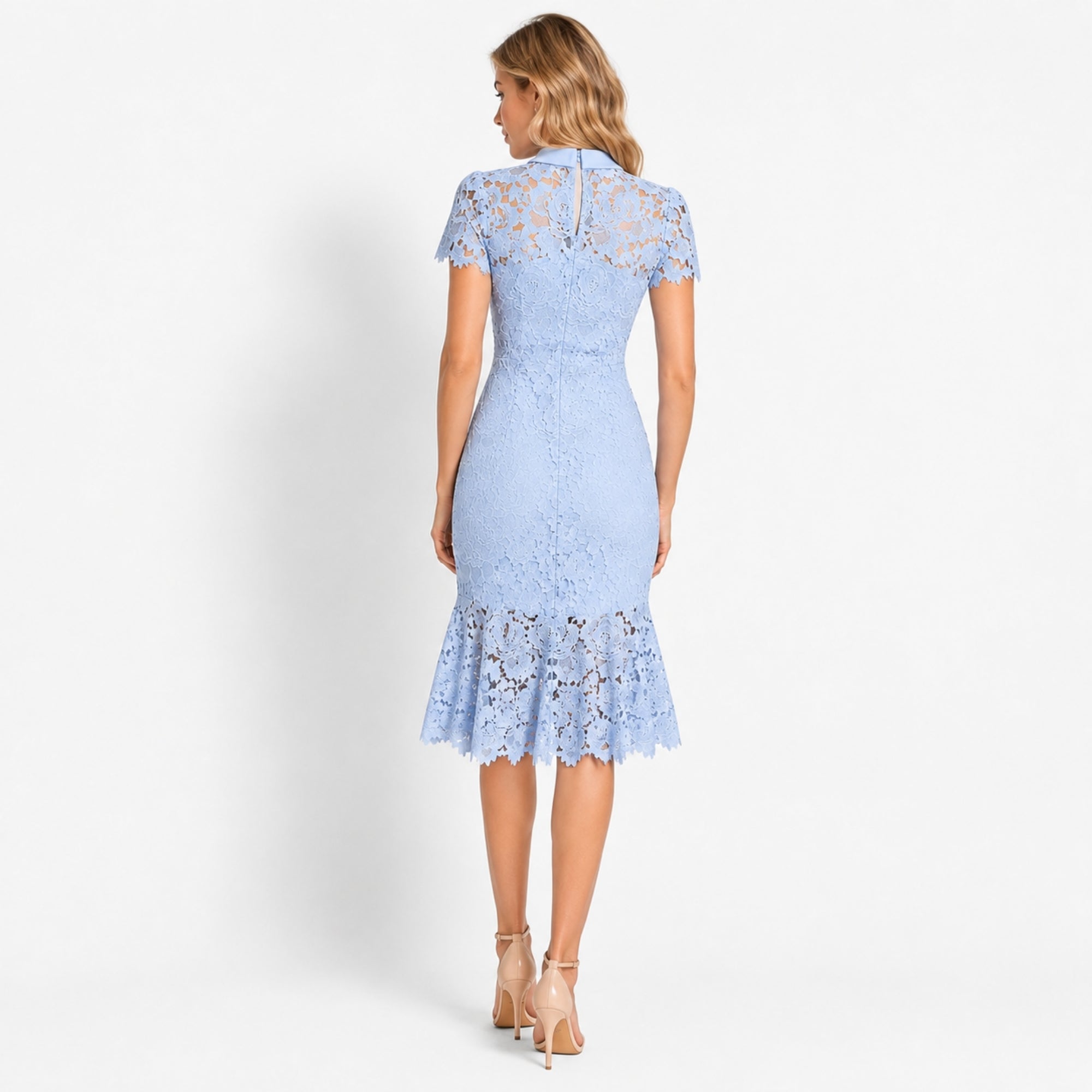 Back view of light blue lace occasion dress featuring keyhole detail and lower sheer flared hem.