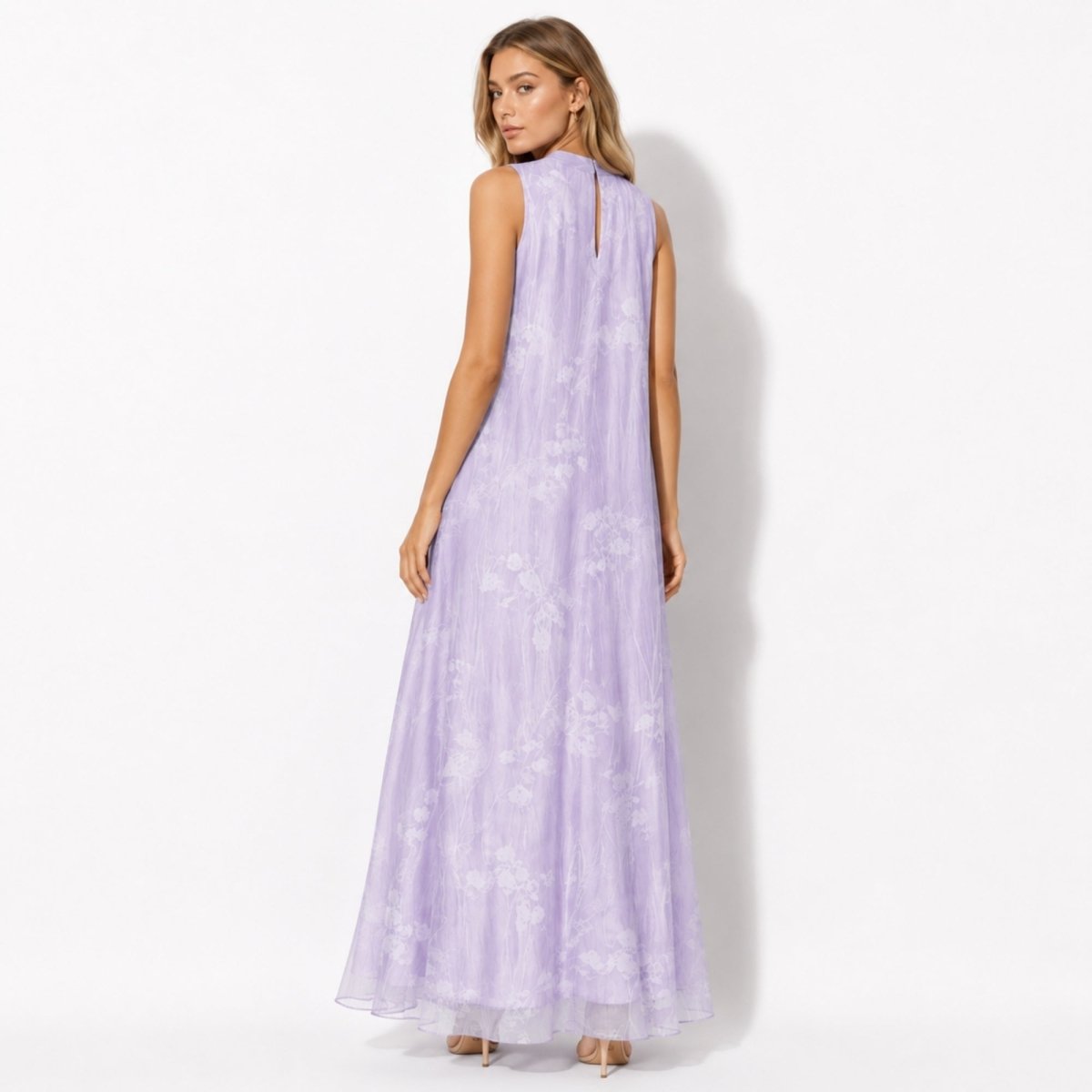 Back view of light purple ethereal sleeveless gown featuring a delicate back neck closure